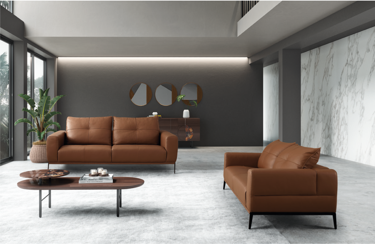 Conjunto de sofás em pele em sala moderna